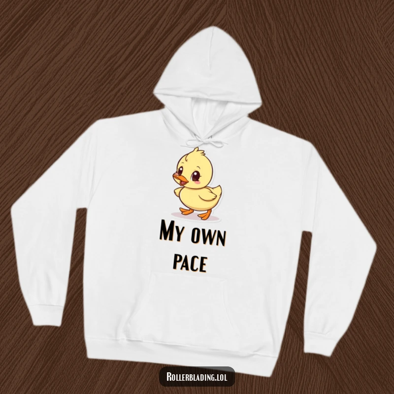 Funny hoodie showcasing a small duck rolling forward with big determination and wide, focused eyes.